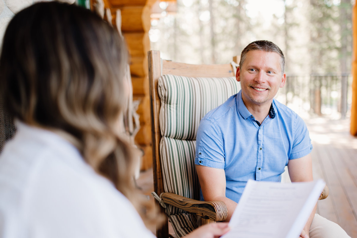 A one-to-one counselling session in the log cabin at Bragg Creek
